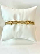 Signature Cross Gold Strand Bracelet-260 eNewton-eNewton-The Lovely Closet, Women's Fashion Boutique in Alexandria, KY