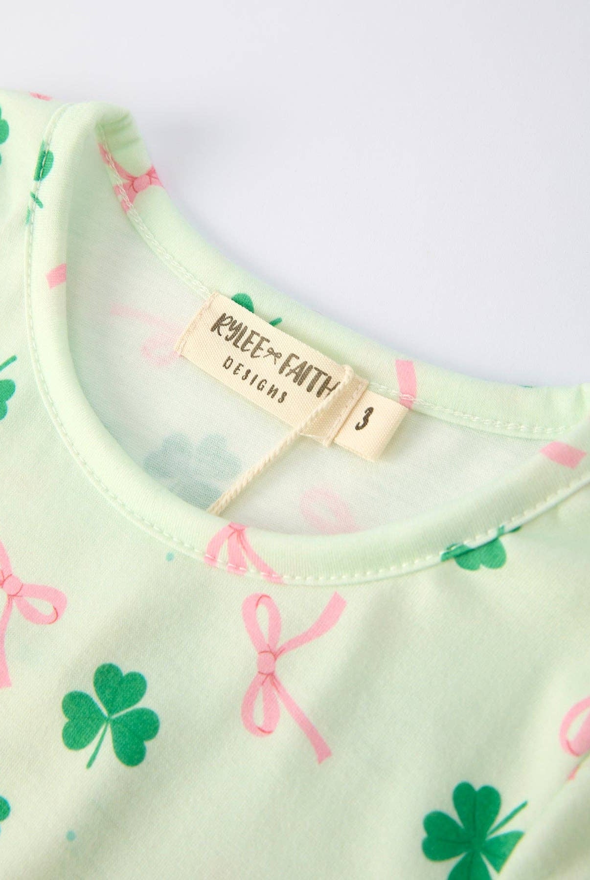St. Patrick's Day Bow Shamrock Print Ruffles Girls Dress-360 Carolines Closet-Rylee Faith Designs-The Lovely Closet, Women's Fashion Boutique in Alexandria, KY