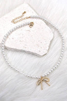 Pearl Bow Necklace with Bow Charm-280 Accessories-JOSSLYN by wall to wall-The Lovely Closet, Women's Fashion Boutique in Alexandria, KY