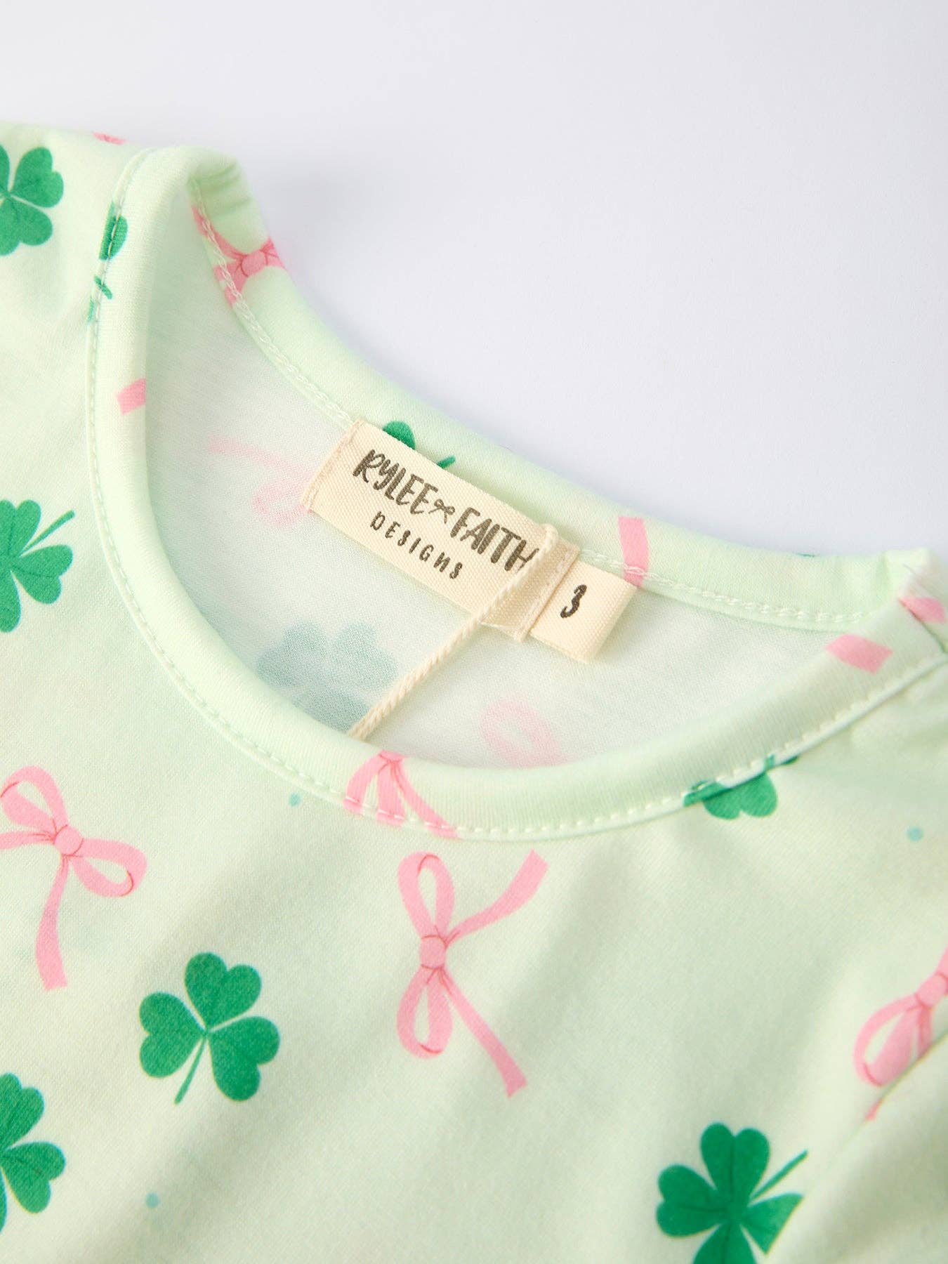 St. Patrick's Day Bow Shamrock Print Ruffles Girls Dress-360 Carolines Closet-Rylee Faith Designs-The Lovely Closet, Women's Fashion Boutique in Alexandria, KY